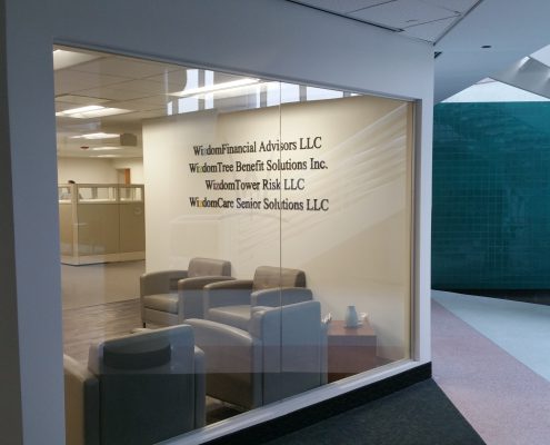 Dimensional lettering over custom wallpaper