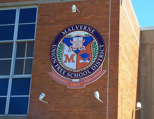 Medallion sign on building face