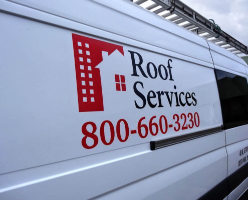 Roof Services van with vinyl logo and lettering