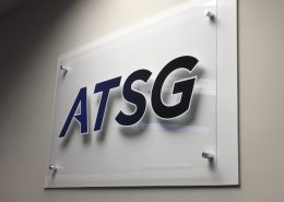 Mounted standoff sign in acrylic and PVC with vinyl for ATSG IT