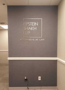 Brushed aluminum dimensional letters on lobby wall, Melville NY